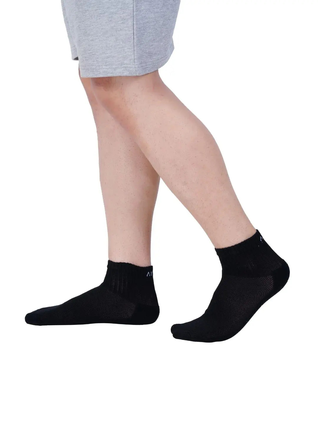 High ankle socks made with moisture-wicking fabric to keep feet dry during activity